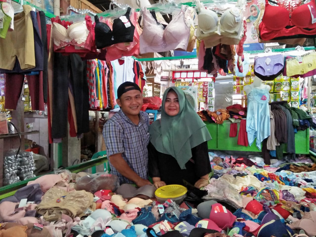 mengelola bisnis pakaian pasar